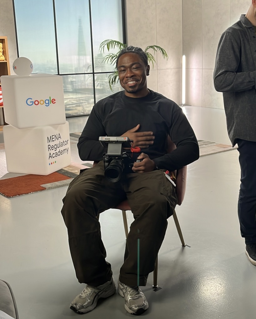 Ibby Onitolo on set with camera